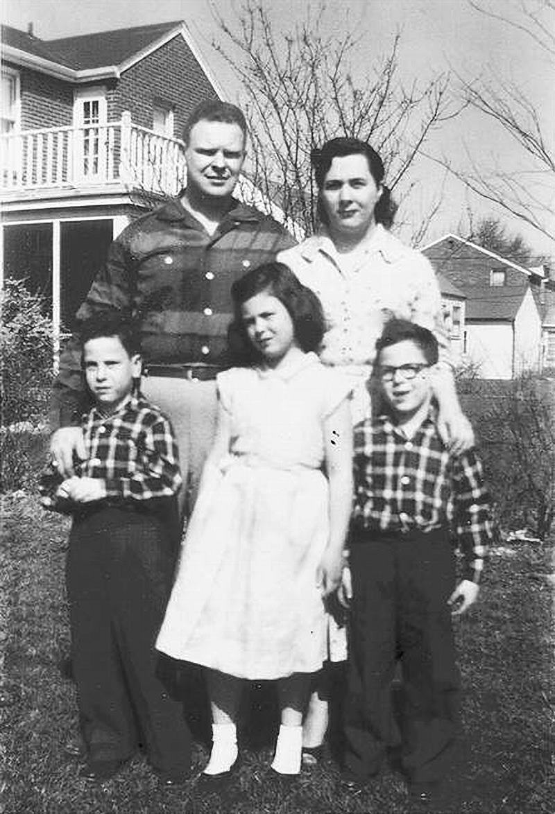 Jeff (left) with his family in Detroit c 1955. His twin brother is on the right