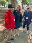 U.S. Representative Melanie Stansbury talks with two Veterans